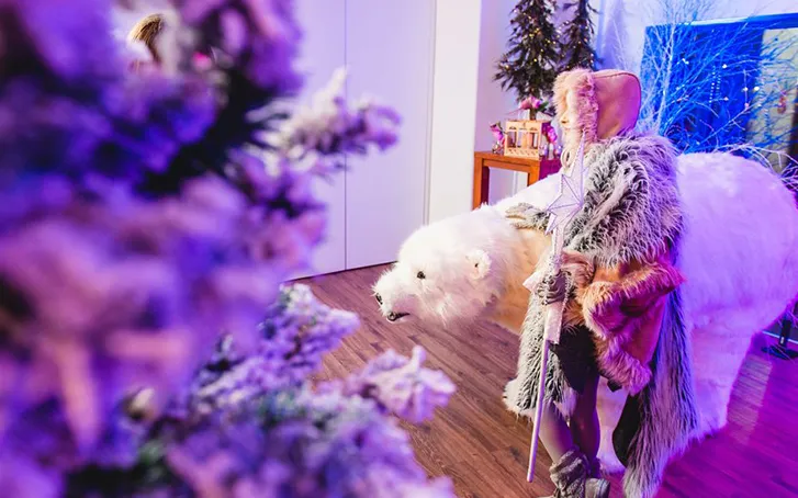 Corporate event snow actor with polar bear prop