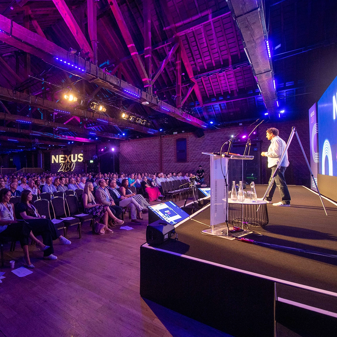 Large company conference with staging and lighting
