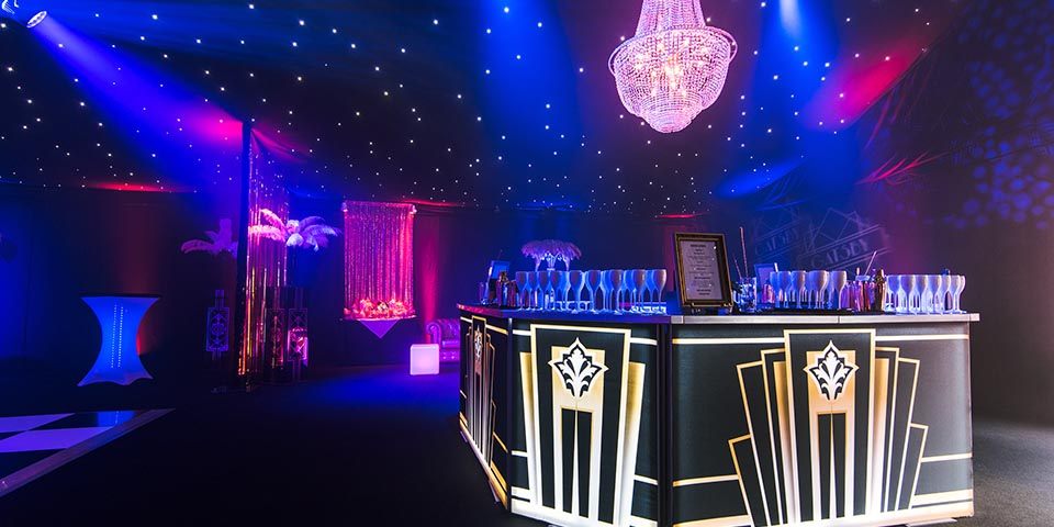 Gatsby themed party decor inside a marquee