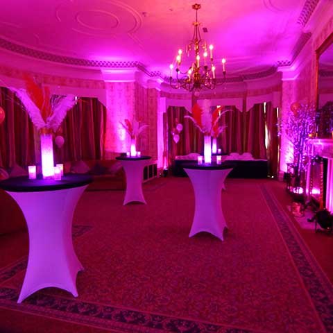 sweet 16 pink theme poseur tables and pink LED lighting