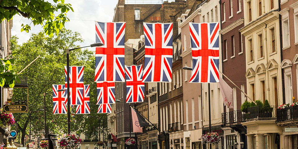 Union flags hanging in street coronation party - MGN Events